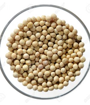 A bowl with dried peas, isolated on white